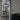 Modern black double hinged glass door with frame in a contemporary living room interior
