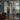 Modern black metal framed double glass doors with side panels in stylish home interior
