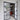 Modern double hinged glass door with black metal frame in a bright interior with white wooden floor