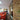 Modern interior with industrial black metal framed glass door and exposed brick wall