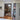 Interior view of a room with double hinged black-framed glass doors opening to a study and pool table area