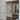 Modern double hinged glass door with metal frame in a minimalist interior space