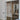 Modern double hinged glass door with metal frame in a minimalist interior space