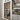 Interior black-framed double hinged glass door next to a bookshelf with books and miscellaneous items