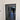Modern double hinged black framed glass door with grid pattern, white walls, marble floor with patterned border