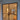 Double hinged black metal frame glass doors leading to a construction area with ladder and wooden planks