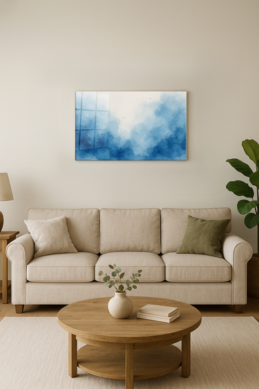 Modern living room with beige sofa, wooden round coffee table, abstract blue watercolor wall art