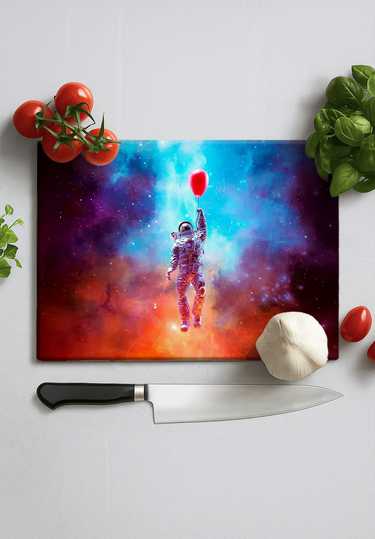 Colorful space-themed chopping board with an astronaut holding a red balloon, surrounded by fresh ingredients