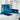Modern kitchen with glossy blue sparkle glass splashback, white cabinets, gas stove, and stainless steel sink