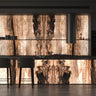 Modern kitchen with a large decorative LED back illuminated backsplash featuring a wood grain pattern.