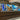Bespoke LED backlit glass kitchen splashback with vibrant blue and gold abstract design
