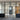 Modern black grid double glass doors with two side panels in interior space