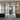 Modern black grid double glass doors with two side panels in interior space