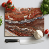 Premium stone patterned chopping board with fresh tomatoes, basil, garlic, and chef's knife on white surface