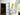 Modern frosted glass hinged door with black frame in bright room featuring abstract yellow painting and decorative table