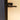 Modern black metal hinged door handle on frosted glass panel door with blue frame