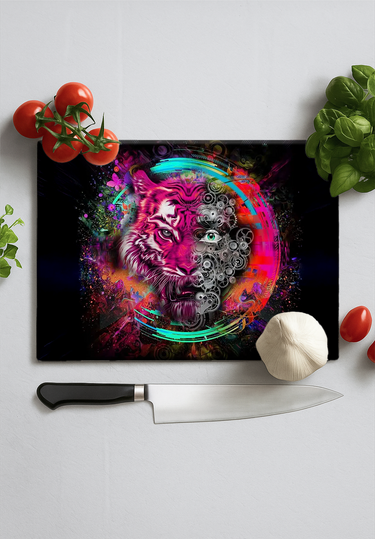 Vibrant chopping board with colorful tiger and mechanical gears design, surrounded by tomatoes, garlic, basil, and kitchen knife