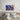 Bespoke blue and gold decorative glass wall art above modern bedroom bed, featuring abstract patterns for luxury interiors.