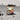 Abstract art glass splashback in modern kitchen with white cabinets and marble countertop