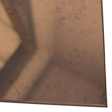 Bespoke architectural glass panel with subtle texture and warm tone for luxury interiors