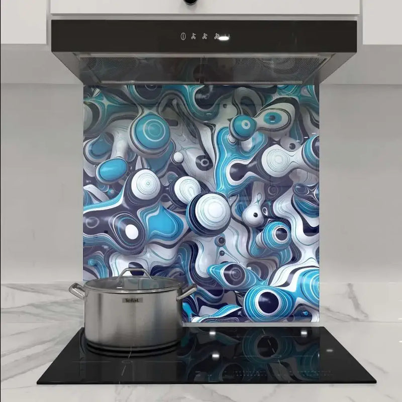 Bespoke abstract blue and white glass kitchen splashback with modern induction hob