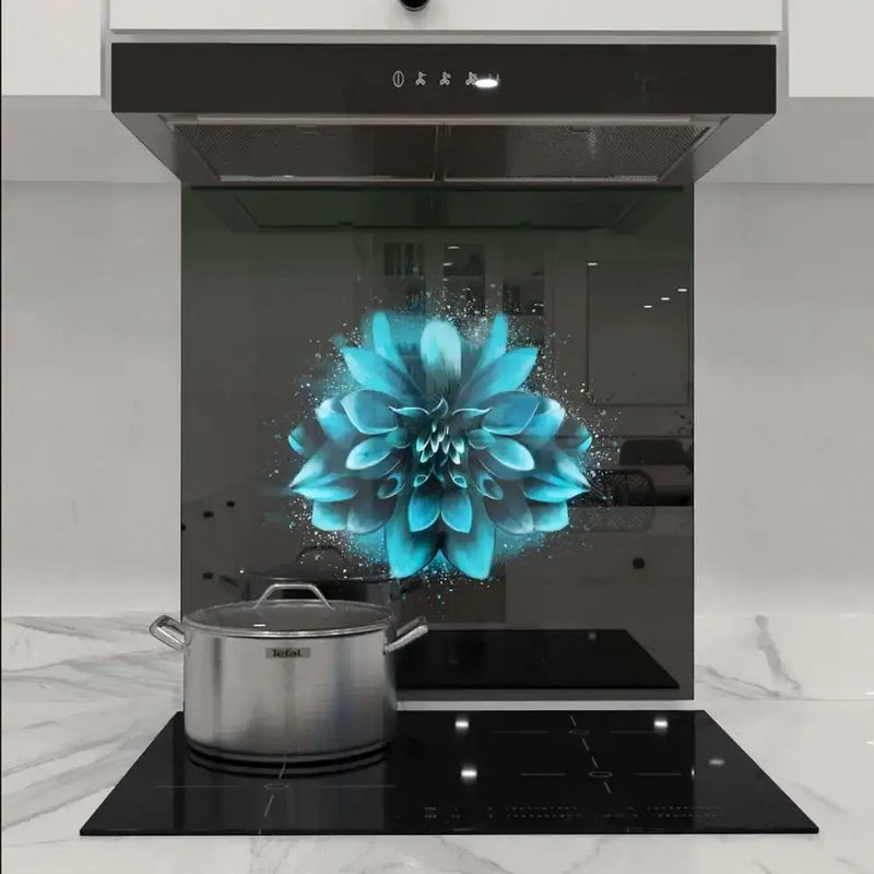 Bespoke blue floral glass splashback in modern kitchen with induction hob and extractor