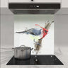 Bespoke glass kitchen splashback with red bird artwork, modern luxury decor