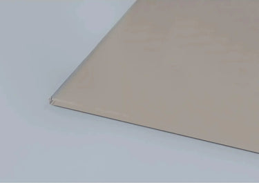 Close-up of sleek, frosted architectural glass panel with clean edge detail for modern interiors