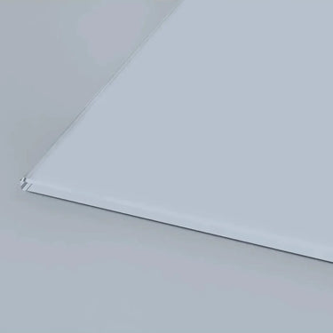 Bespoke architectural glass panel with clean edge detail for modern interiors