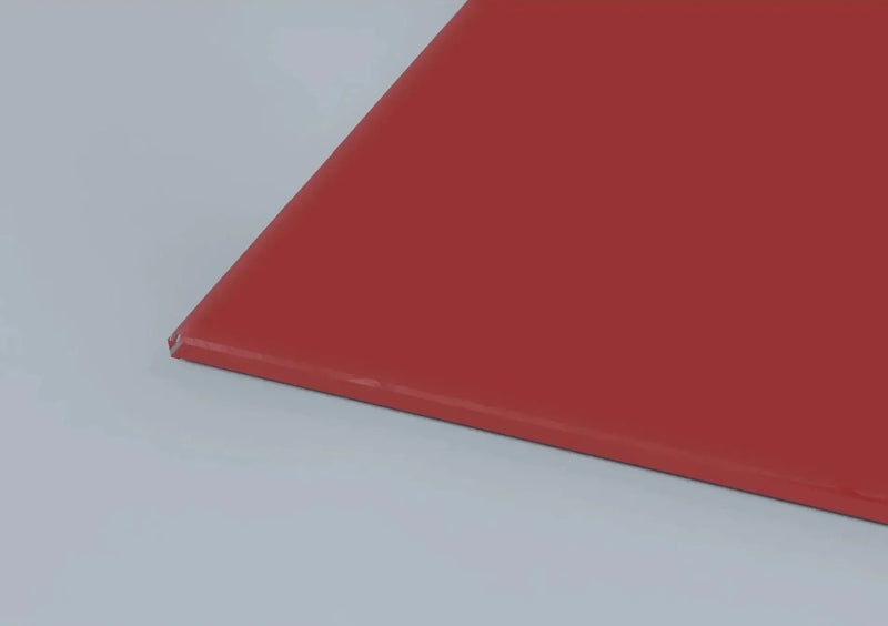 Vibrant red architectural glass panel with polished edge, ideal for bespoke interior design and decorative features.
