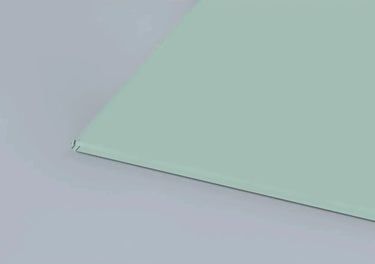 Smooth mint green architectural glass panel with polished edge, ideal for modern interiors and bespoke installations.