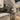 Luxury kitchen with bespoke glass splashback, marble countertops, and stainless steel appliances