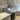Luxury kitchen with bespoke feature mirror backsplash, sleek cabinets, and modern appliances