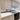 Luxury kitchen with bespoke glass splashback, white shaker cabinets, and black range cooker