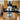 Modern kitchen with wooden cabinets, black countertop, and glass backsplash reflecting light