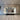 Bespoke feature mirror above kitchen island, reflecting luxury residential interior with recessed lighting