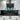 Modern kitchen with black glass backsplash and LED-lit feature panel above gas hob