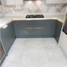 Modern kitchen with marble-effect glass splashback and sleek grey cabinets