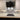 Marble-effect glass kitchen splashback with under-cabinet lighting, modern luxury kitchen design