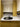 Bespoke decorative glass backsplash with marble and gold veining in modern kitchen