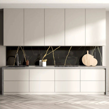 Luxury kitchen with black marble-effect glass splashback featuring gold veining, modern cabinets and concrete countertop
