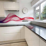 Modern kitchen with red wave-patterned decorative glass splashback and white cabinets