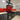 Red LED backlit glass kitchen splashback featuring London skyline and Ferris wheel design