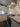 Modern kitchen with sleek white cabinets, stainless steel appliances, and a glass backsplash