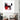 Abstract red black white wall art above modern armchair in luxury living space