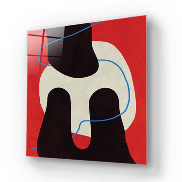 Abstract decorative glass art with bold red, black, and blue shapes for modern interior design