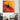 Abstract wall art with bold black figure on fiery orange red background, modern living room decor