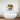 Abstract gold and silver glass art above modern freestanding bathtub in luxury bathroom
