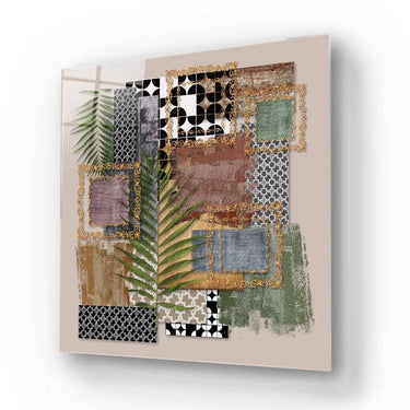 Bespoke decorative glass art with tropical leaves, geometric patterns, and gold accents for luxury interiors