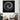 Bespoke decorative glass art with concentric white circles on black, modern interior wall feature